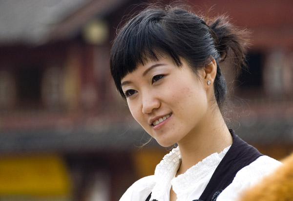 Turystka odwiedzająca Lijiang - zdjęcia z Chin