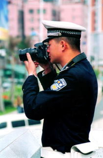Policjant czy fotograf